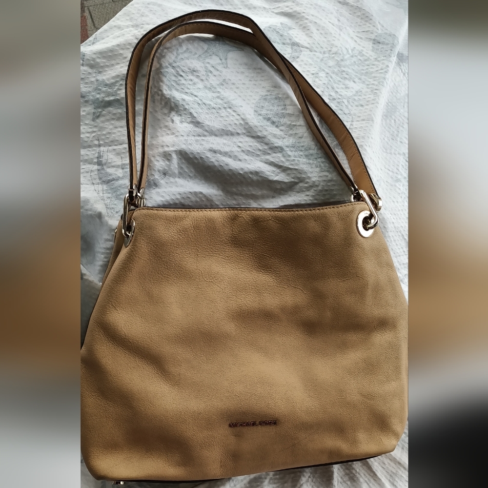 Michael Kors tan purse. Interior also tan.